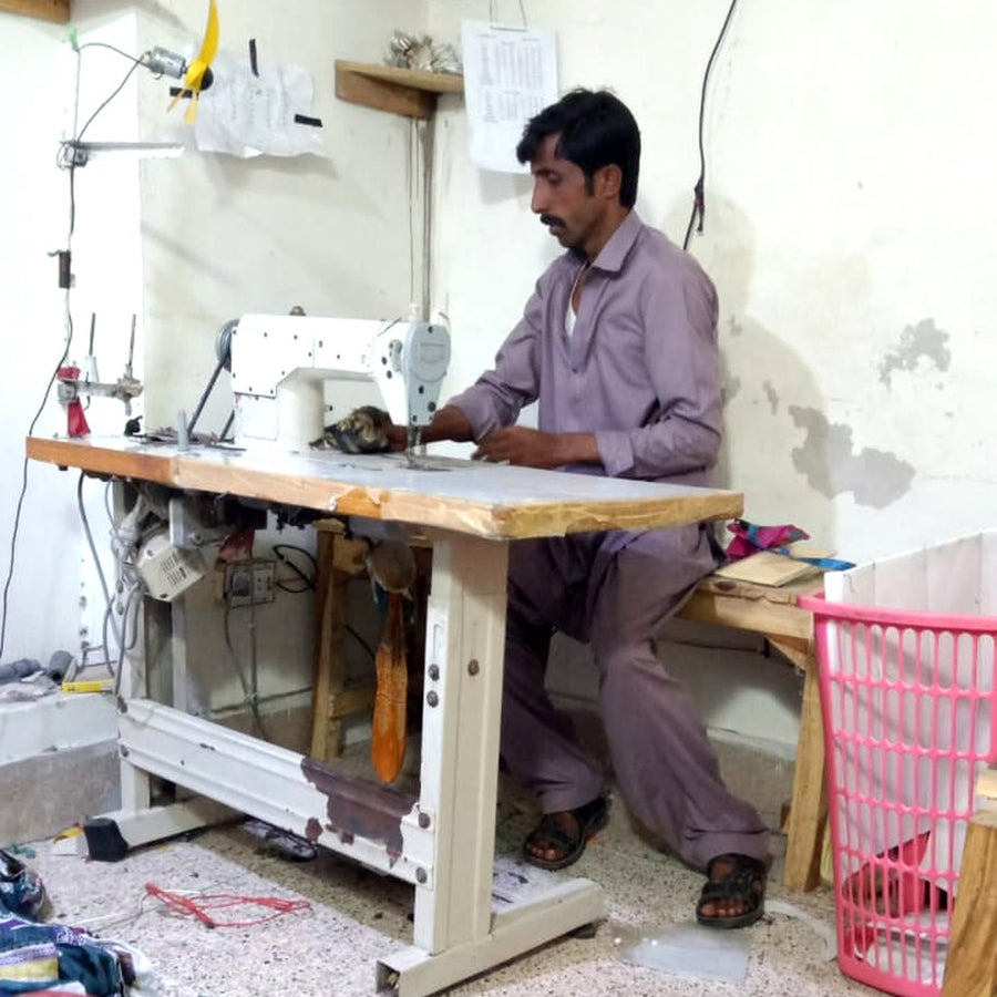 Our tailor at work in the AT80 Stitching Studio