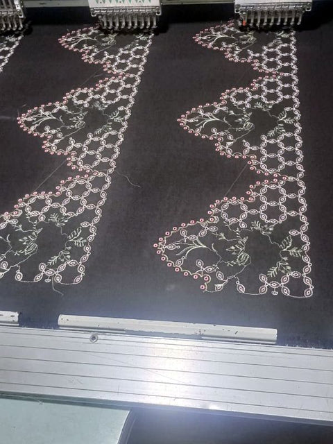 Lace embroidery on a multi-head machine at AT80 Stitching Studio