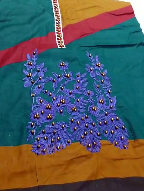 Hand-embellished shirt finished at AT80 Stitching Studio