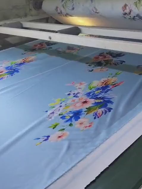 Floral print being transferred onto fabric at Ameen Textile Mills